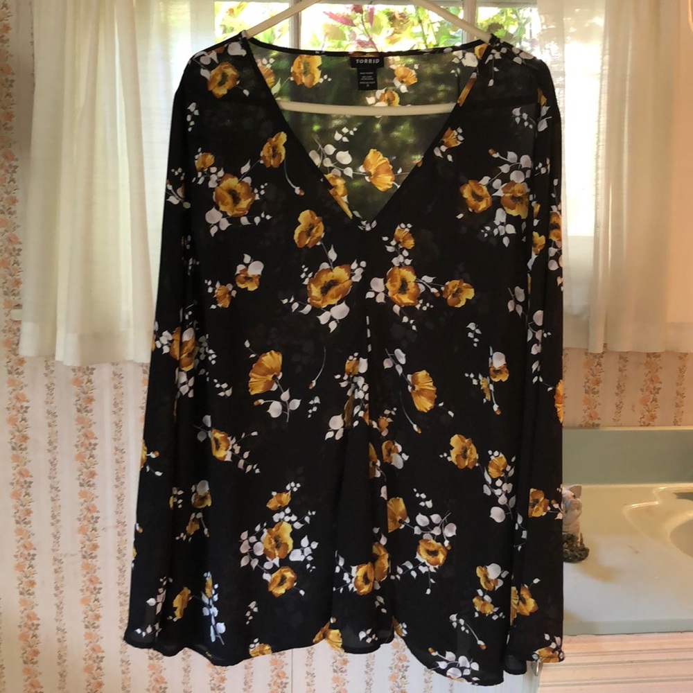 Floral semi-sheer bell sleeved blouse